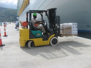 independence-of-the-seas-donations-011 Haiti Relief Effort - Royal Caribbean employee unloads supplies in Labadee from Independence of the Seas