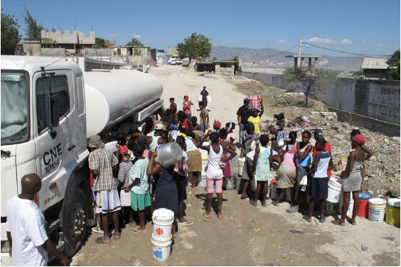 water-distribution-truck Haitians stand in line for fresh water